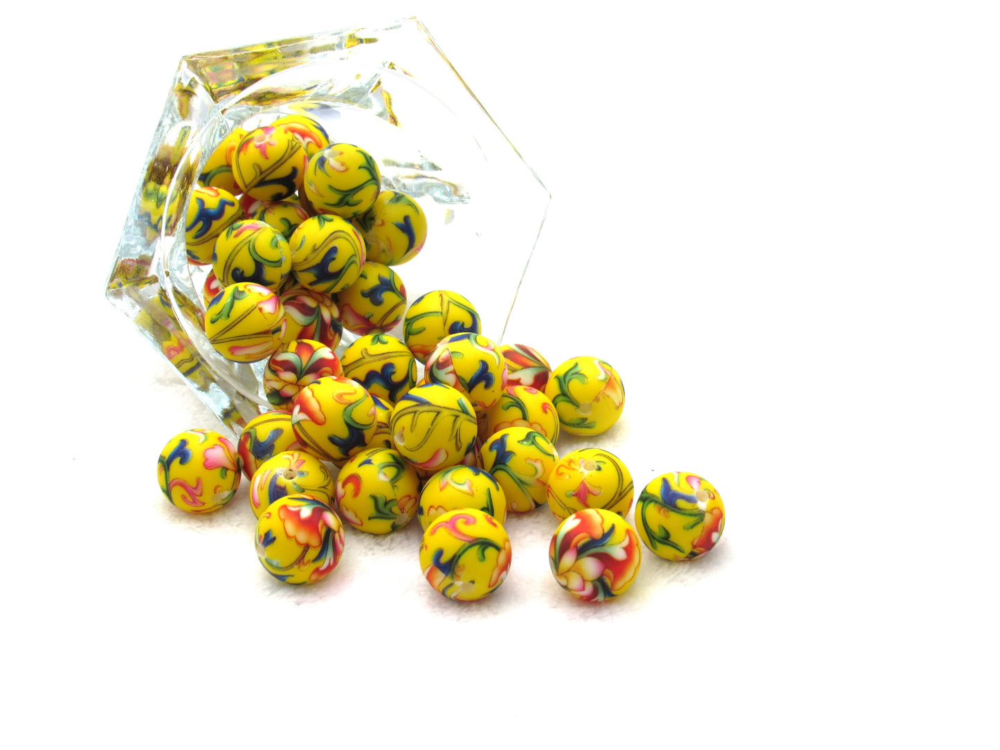 Prints on a yellow 15mm bead in a colorful vine design