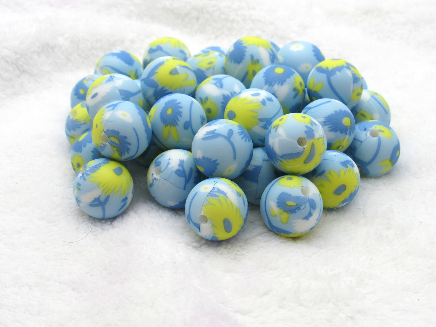 Prints In Blue and Yellow Blossoms printed in a colorful designs